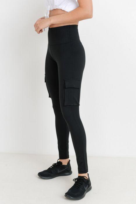 Highwaist Hybrid Cargo Adventurer Leggings featuring cargo pockets, made from polyester-spandex blend, ideal for hiking and rock climbing.