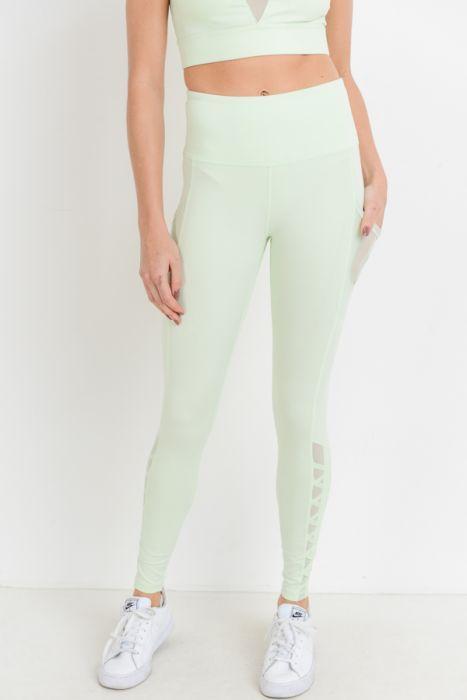 Highwaist Hybrid Mesh & Lattice Straps Full Pocket Leggings featuring stylish mesh panels and convenient side pockets.