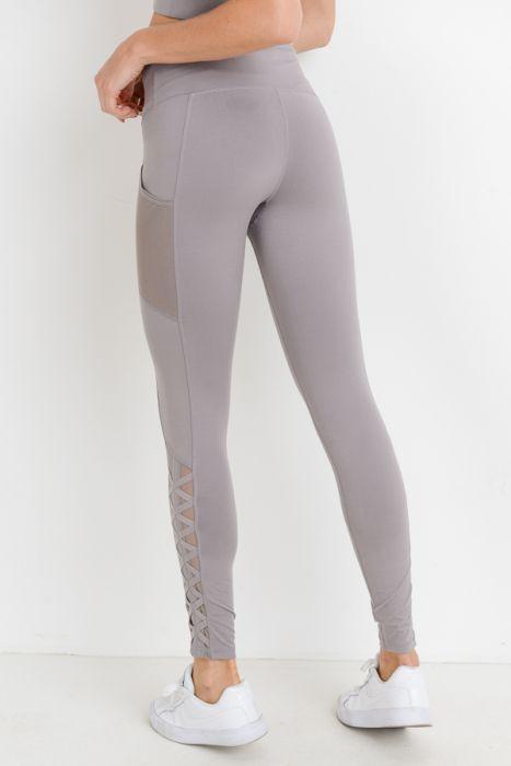 Highwaist Hybrid Mesh & Lattice Straps Full Pocket Leggings featuring stylish mesh panels and convenient side pockets.