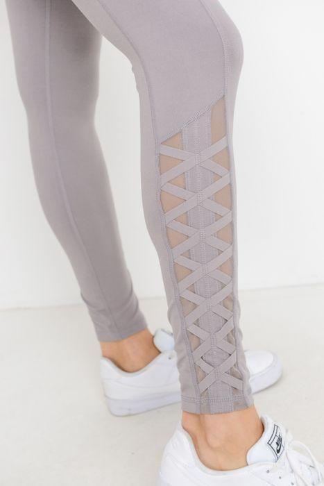 Highwaist Hybrid Mesh & Lattice Straps Full Pocket Leggings featuring stylish mesh panels and convenient side pockets.