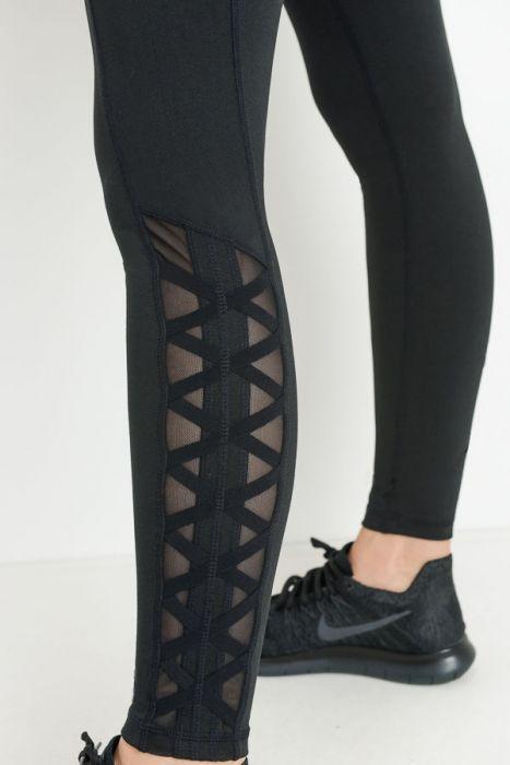 Highwaist Hybrid Mesh & Lattice Straps Full Pocket Leggings featuring stylish mesh panels and convenient side pockets.