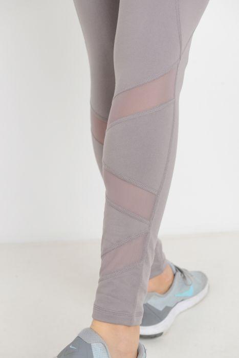 Highwaist Ziggy Zag Pocket Full Leggings featuring slanted mesh accents and a high waist design for support.