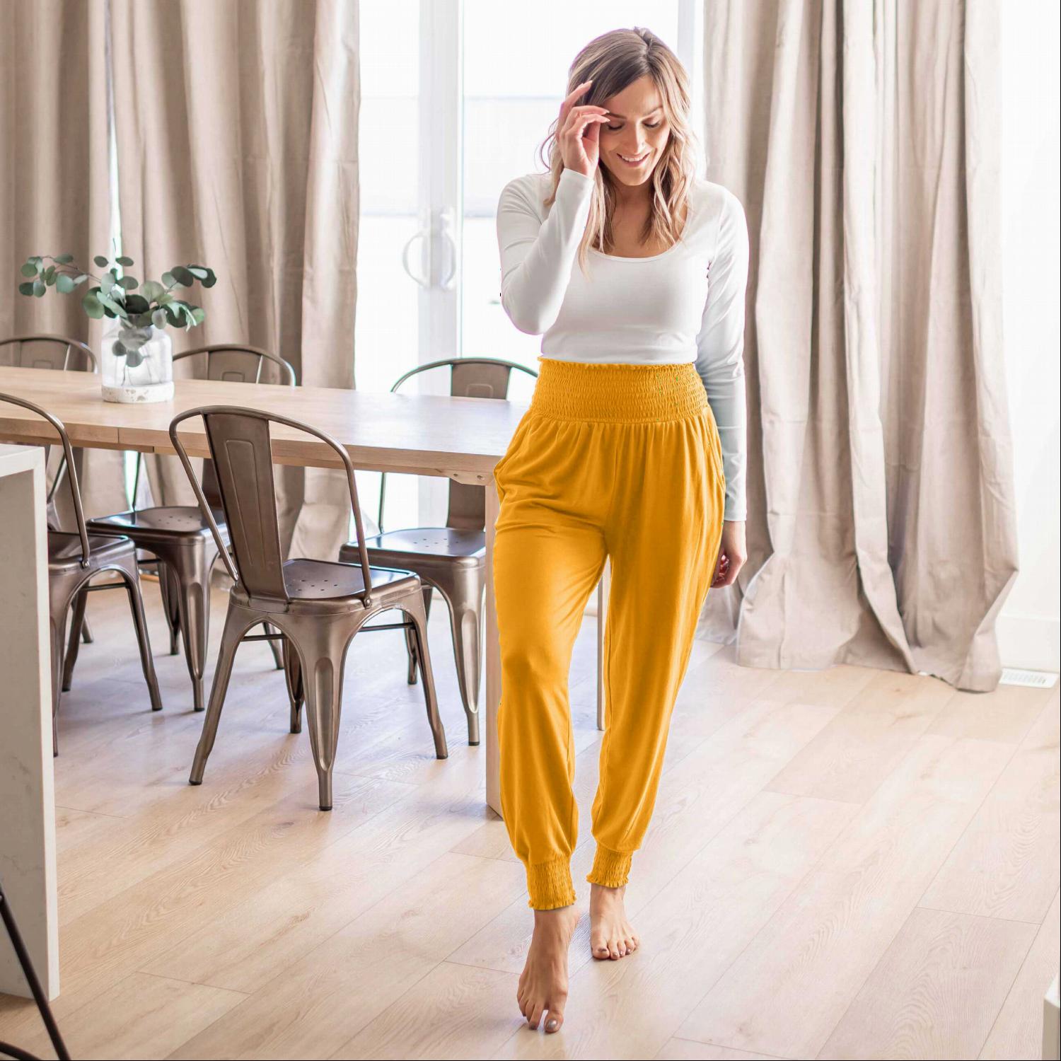 High-waisted Smocked Lounge Jogger Pants in various colors, featuring an elasticated waist and fitted ankles, perfect for lounging or casual wear.