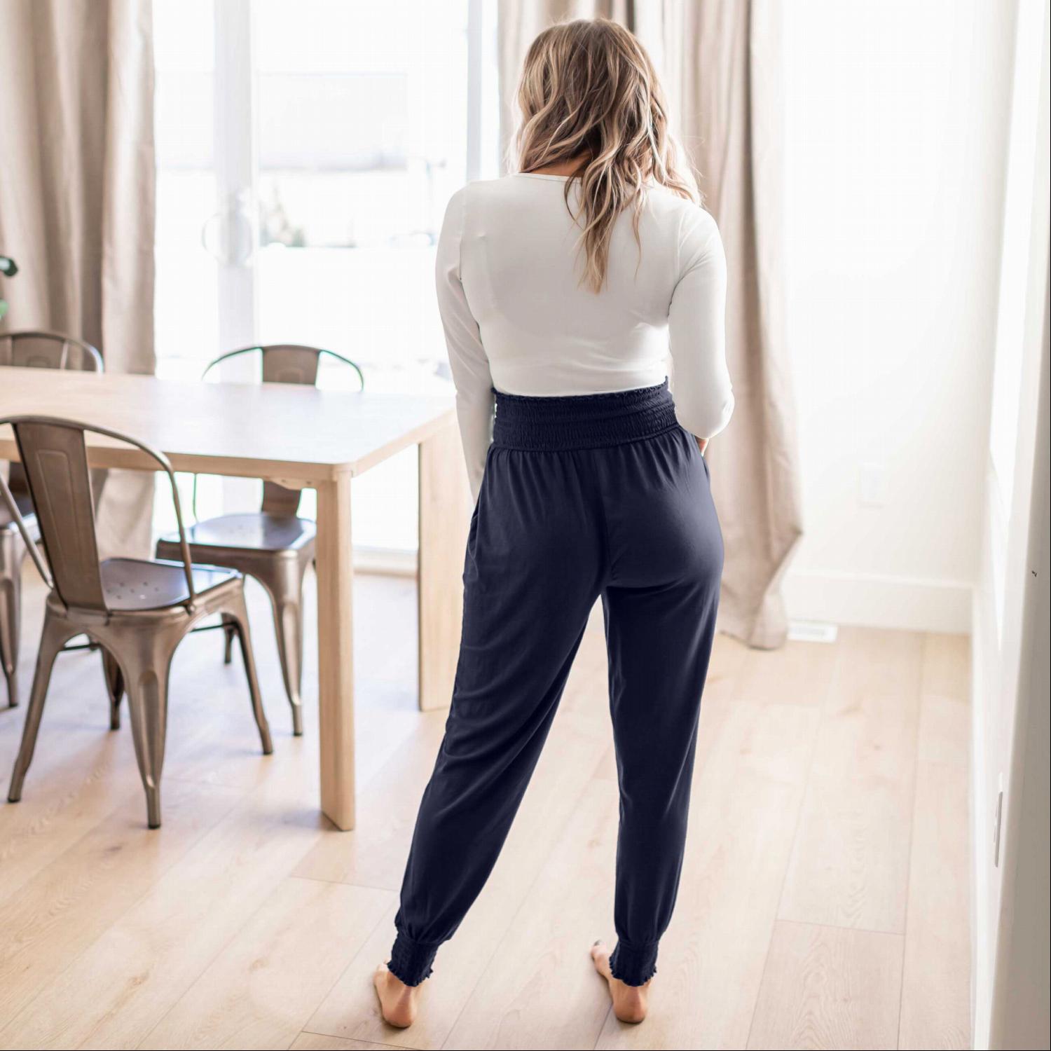 High-waisted Smocked Lounge Jogger Pants in various colors, featuring an elasticated waist and fitted ankles, perfect for lounging or casual wear.