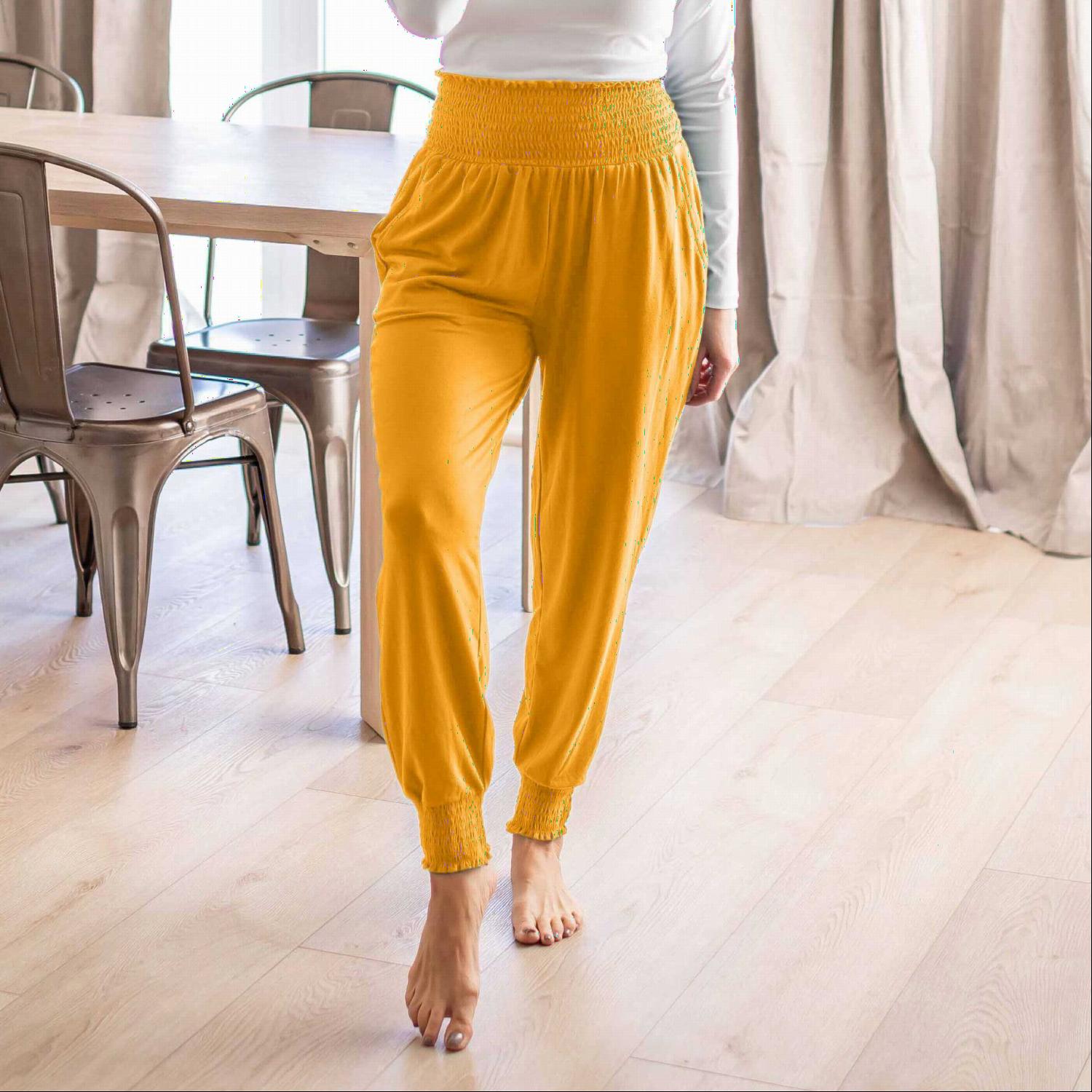 High-waisted Smocked Lounge Jogger Pants in various colors, featuring an elasticated waist and fitted ankles, perfect for lounging or casual wear.