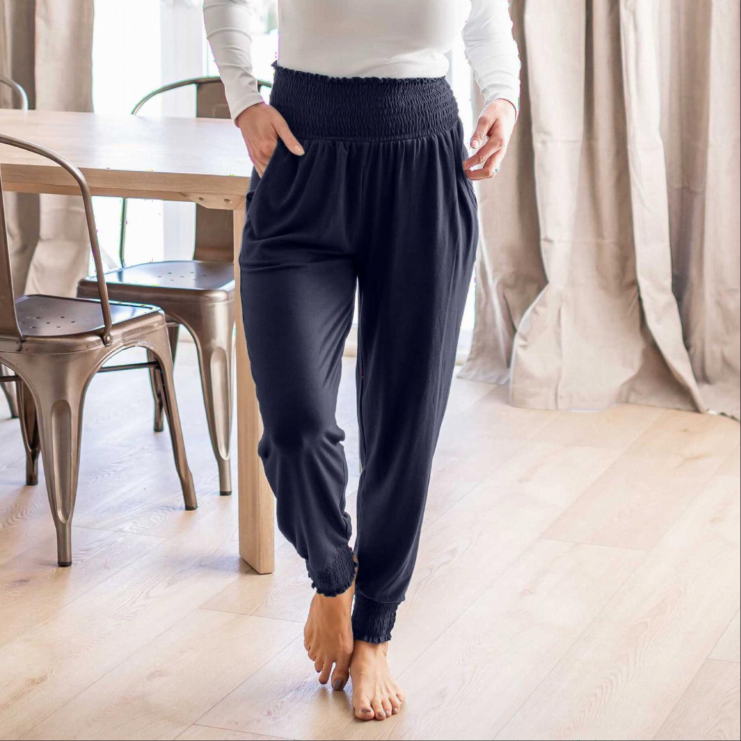 High-waisted Smocked Lounge Jogger Pants in various colors, featuring an elasticated waist and fitted ankles, perfect for lounging or casual wear.