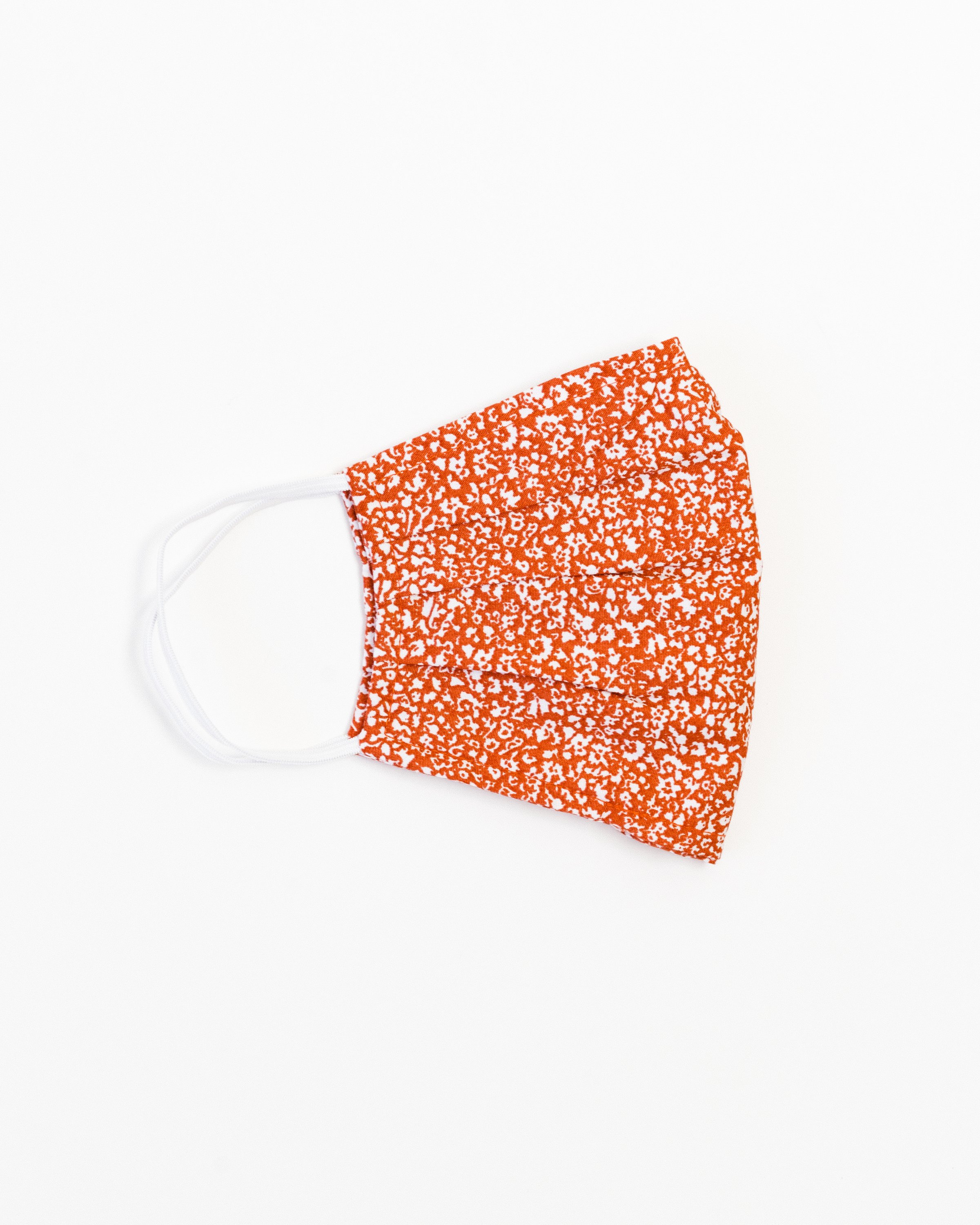 Hilary Face Mask made of breathable cotton with pleats for comfort, featuring a stylish print suitable for all genders.