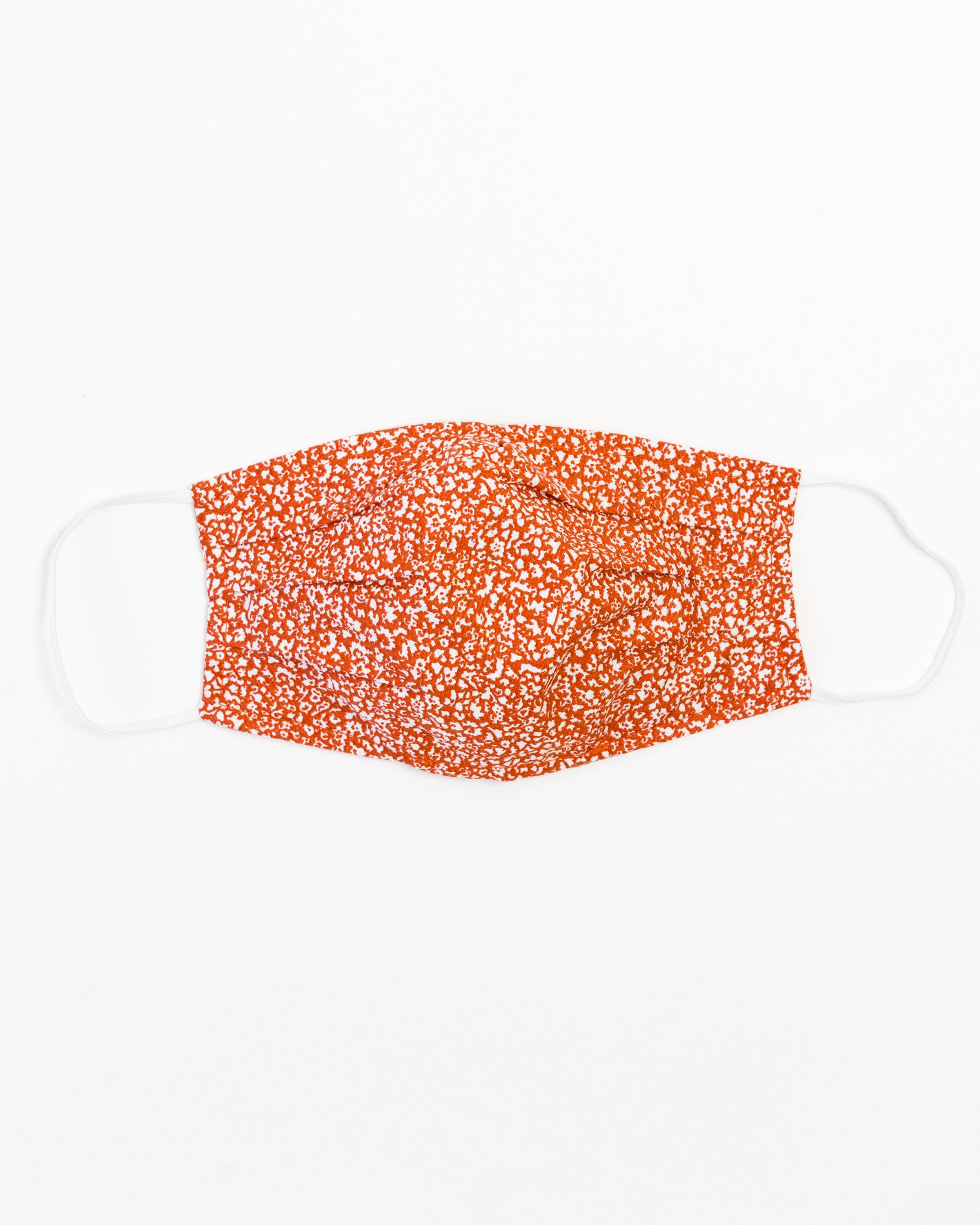 Hilary Face Mask made of breathable cotton with pleats for comfort, featuring a stylish print suitable for all genders.