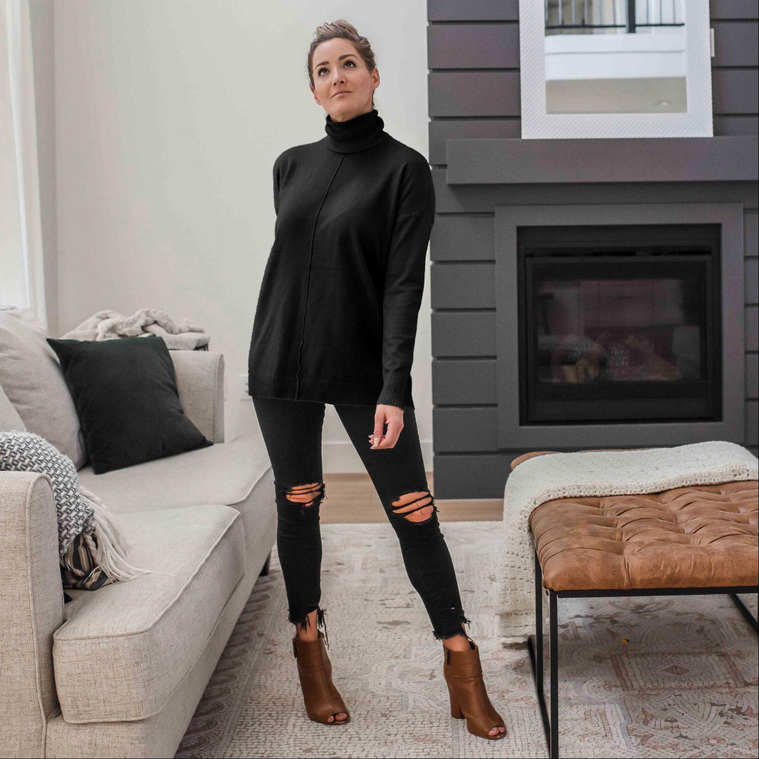 A stylish Hi-low Garment Dyed Turtleneck Sweater featuring a ribbed waistline and wrist cuffs, available in various colors.