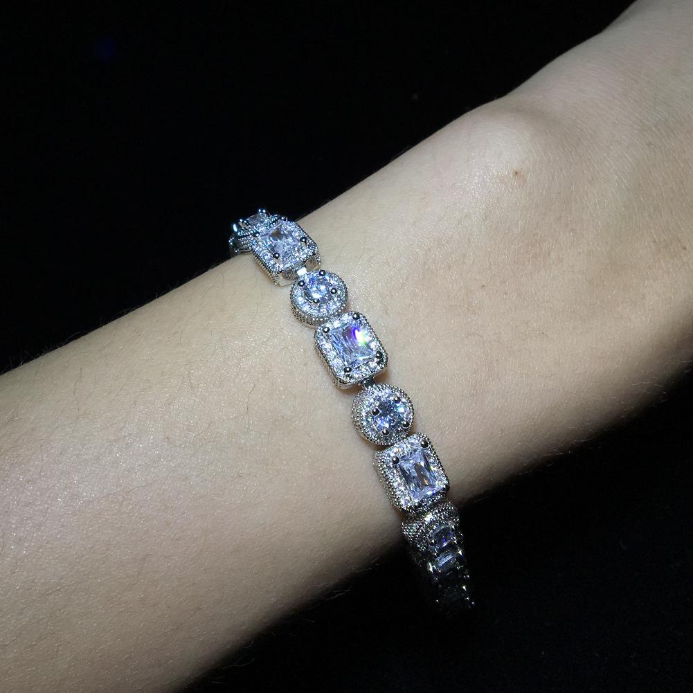 Hip Hop Bling Iced Out Cubic Zirconia Bracelet featuring a stylish iced out design in gold and silver, suitable for men and women.