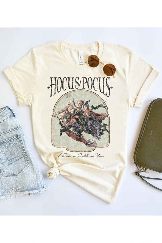 Hocus Pocus Halloween Graphic Tee featuring a vibrant design, made from premium cotton, displayed on a neutral background.