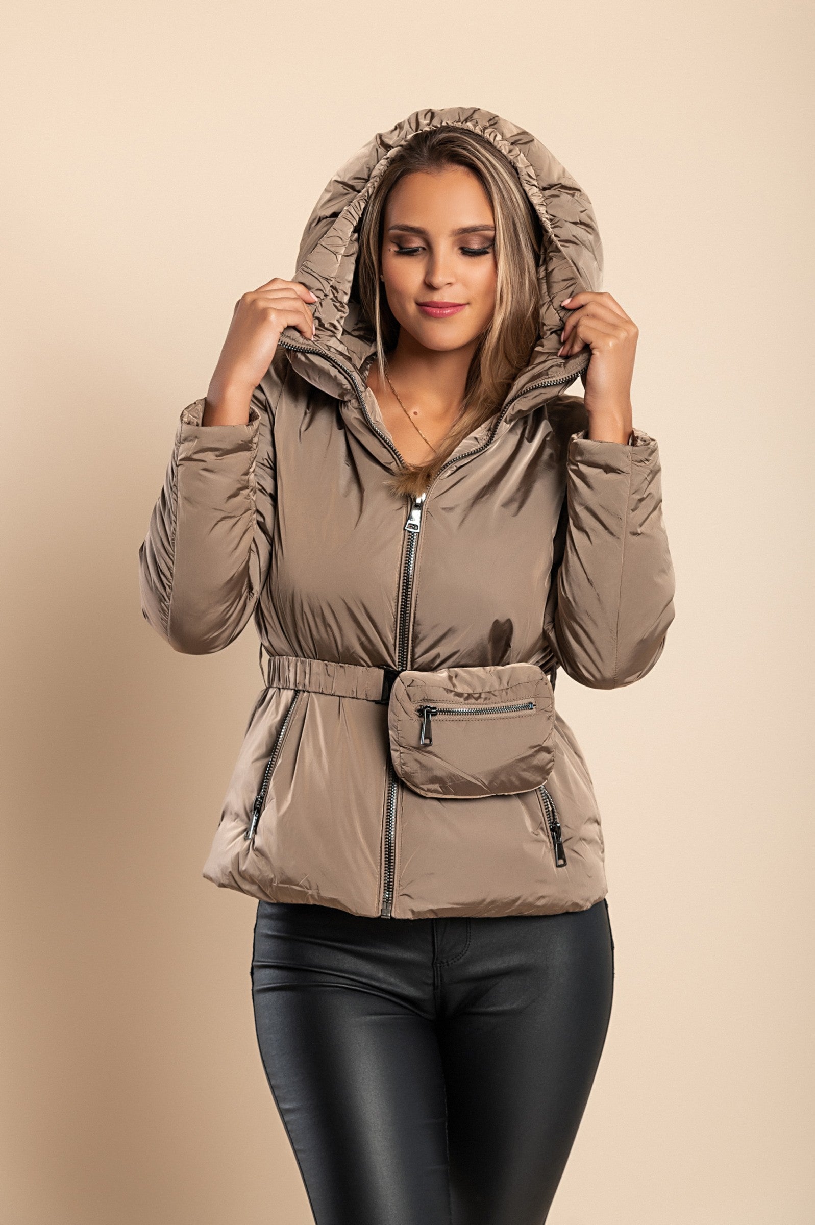 Beige hooded jacket with warm padding, high collar, and side zipper pockets, featuring an elastic belt with a bag.