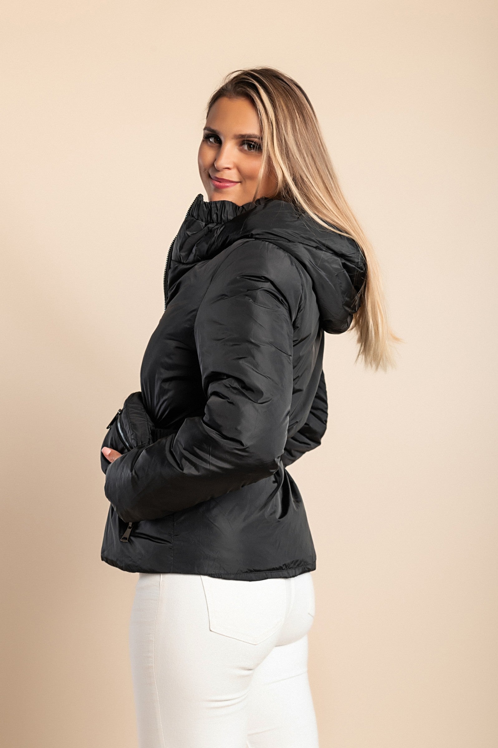 Black hooded jacket with warm padding, high collar, and side zipper pockets, featuring an elastic belt.