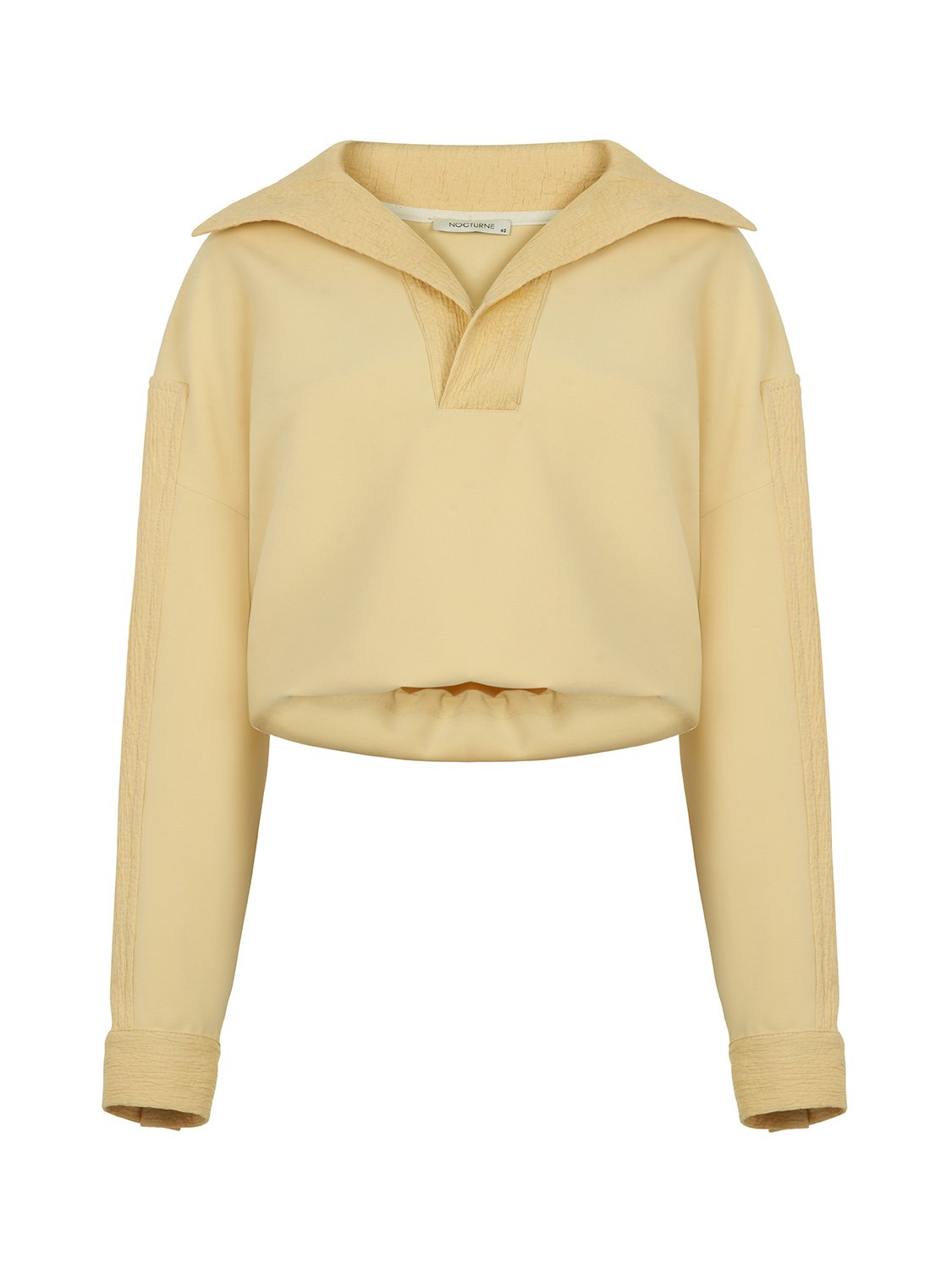 A cozy hooded sweatshirt featuring a wide V-neck, long sleeves, and an elastic waistband, perfect for casual wear.