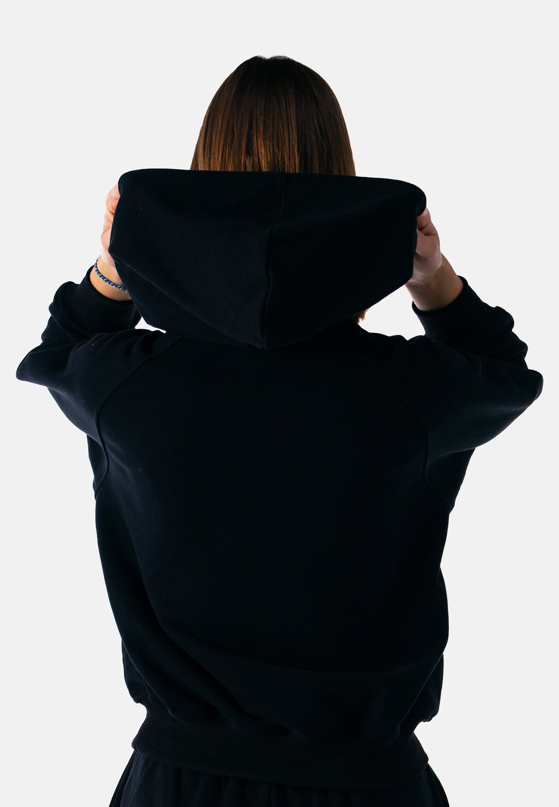 Schwarzer Damen Hoodie Static mit gefütterter Bauchtasche und lockerer Passform, ideal für Alltag und Freizeit.