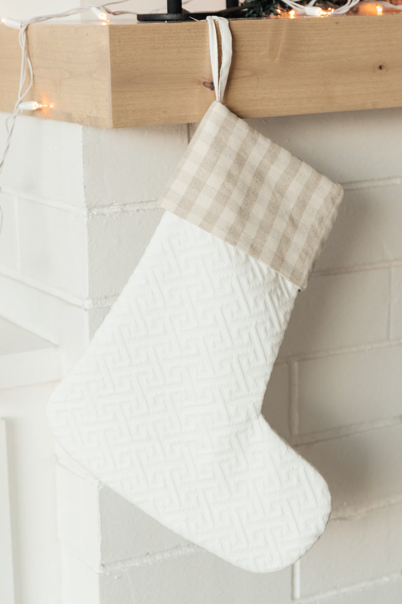 Neutral colored Holiday Chic Stocking with a hanging loop, perfect for festive decor.