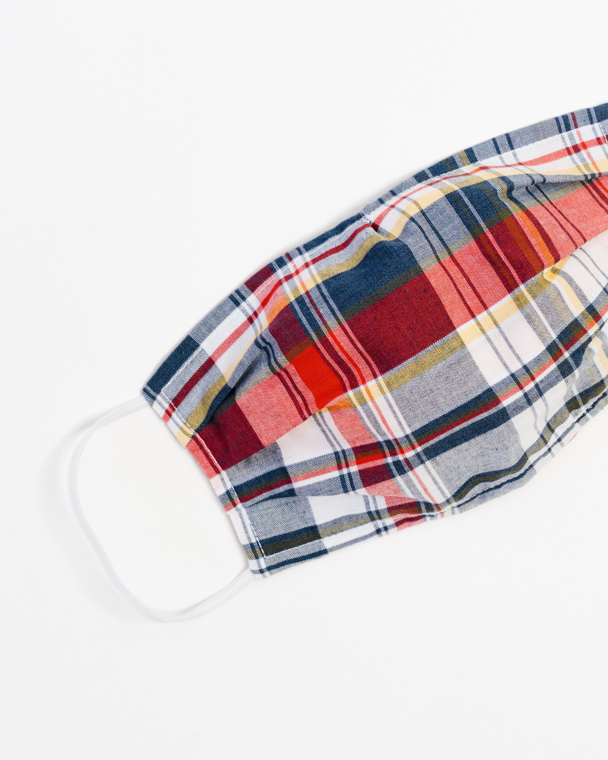 Holiday Plaid Large Face Mask made of breathable cotton with elastic ear straps, featuring a festive plaid design and a filter pocket.