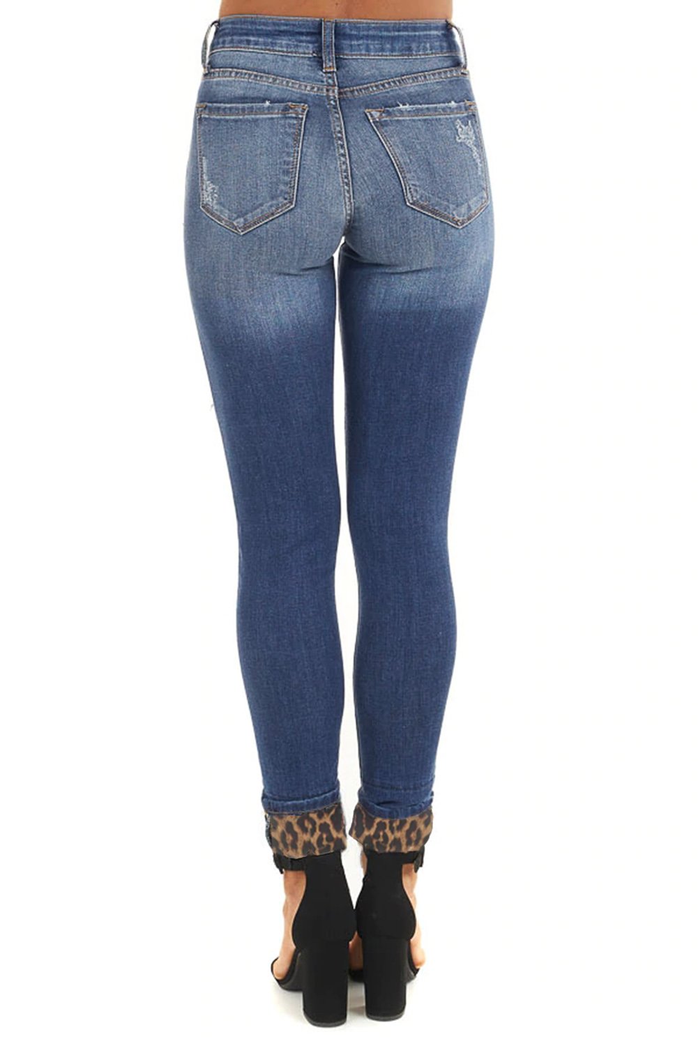 Hollow Out Leopard Patchwork Distressed Jeans showcasing unique design and stylish details.