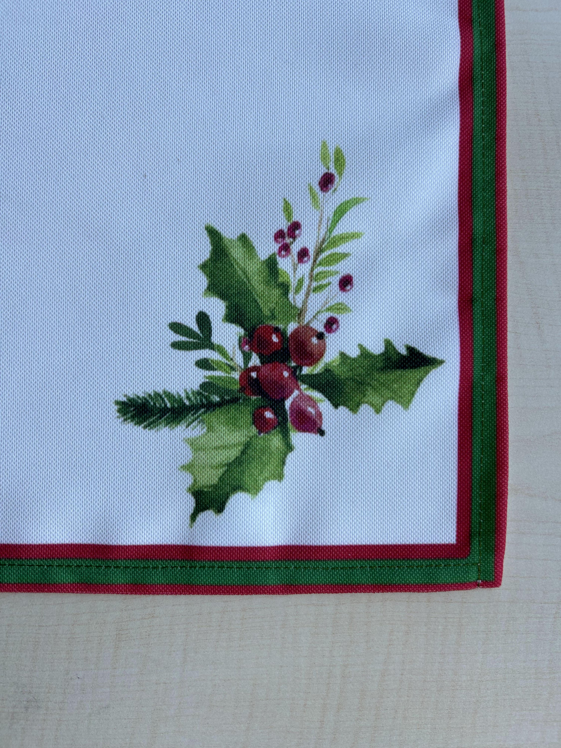 Holly Berry and Greenery Pattern Placemats on an ivory background, featuring a festive holiday design with traditional colors.