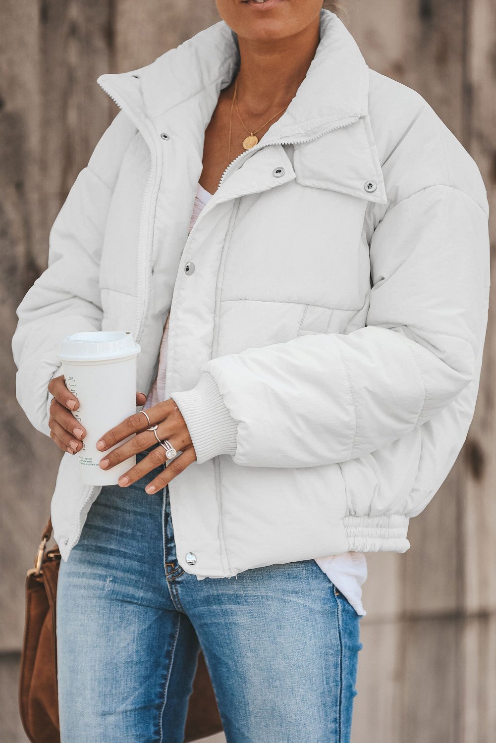 Holly Pocketed Puffer Jacket in stylish design with deep pockets, showcasing its soft fabric and dual closure.