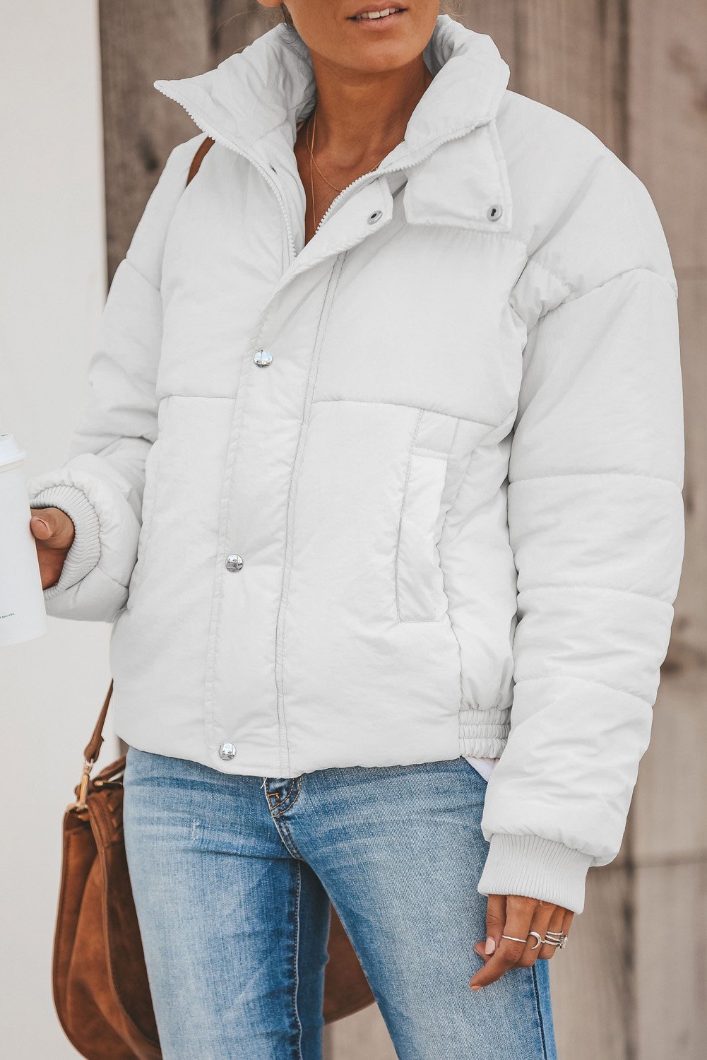 Holly Pocketed Puffer Jacket in stylish design with deep pockets, showcasing its soft fabric and dual closure.