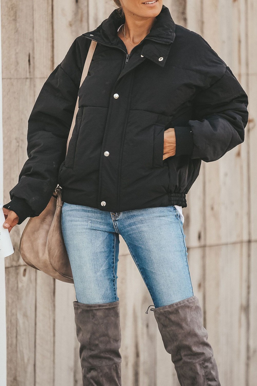 Holly Pocketed Puffer Jacket in stylish design with deep pockets, showcasing its soft fabric and dual closure.