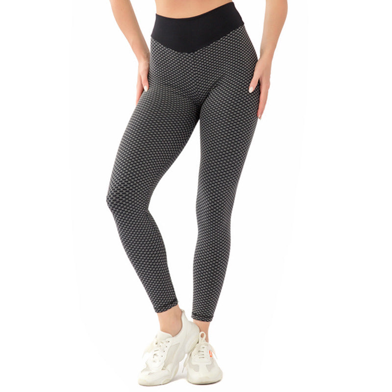 Honey Peach Hip Seamless Yoga Pants displayed on a model, showcasing their tight fit and stylish design, perfect for fitness and yoga activities.