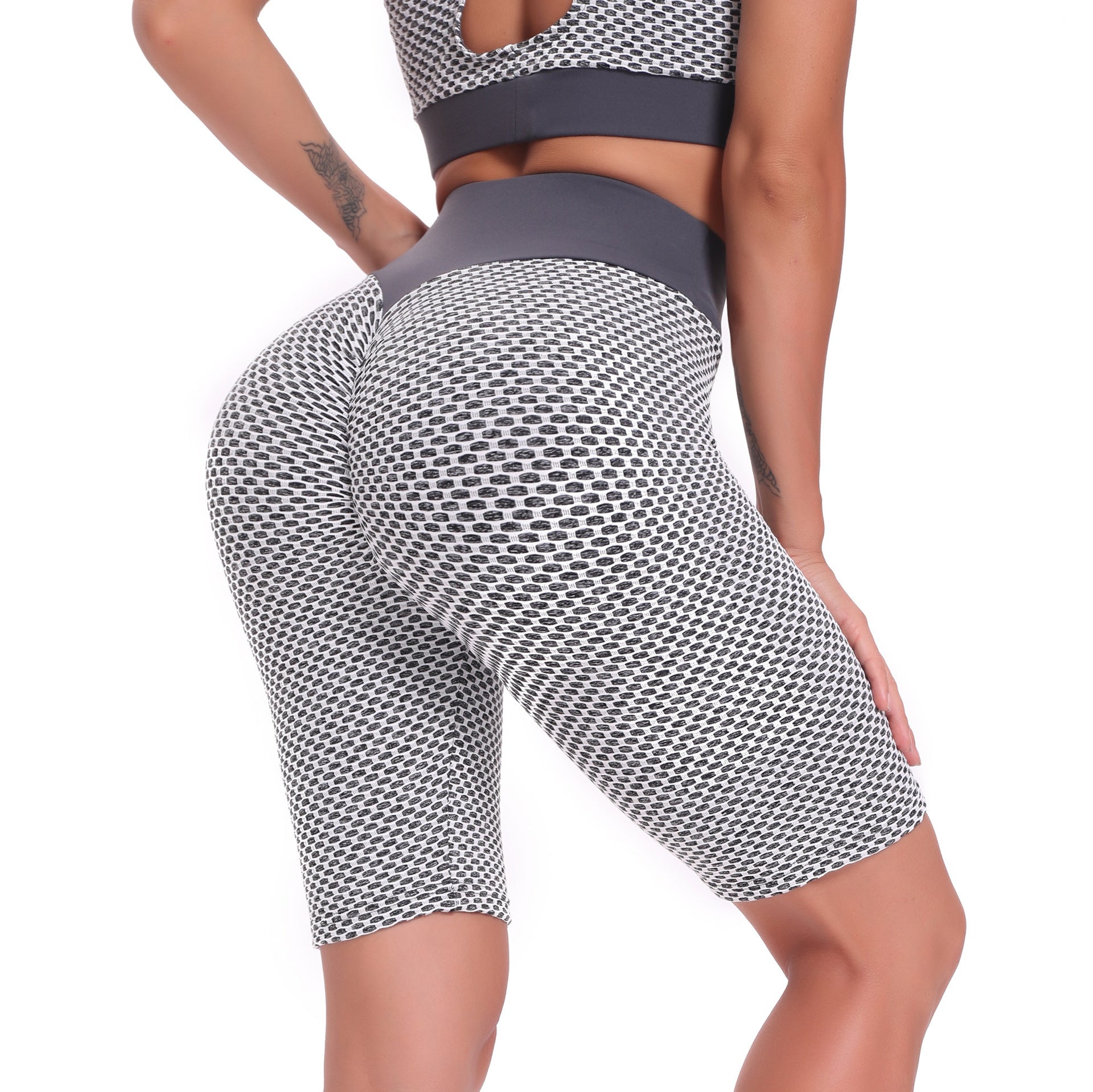 Honey Peach Hip Seamless Yoga Pants displayed on a model, showcasing their tight fit and stylish design, perfect for fitness and yoga activities.