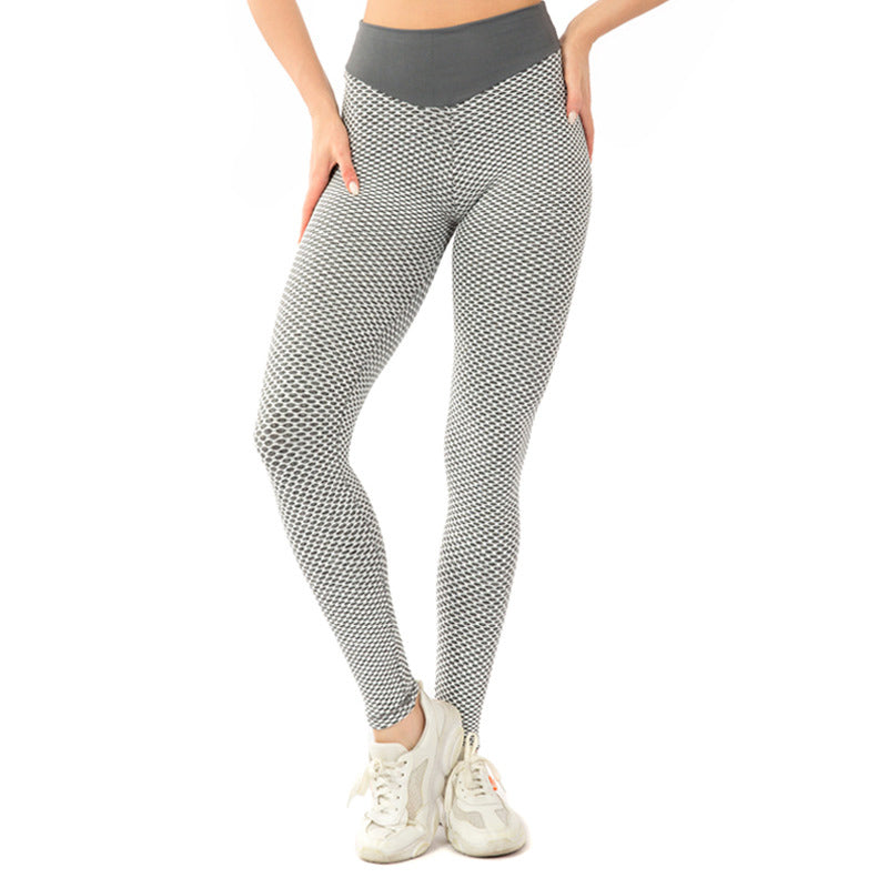 Honey Peach Hip Seamless Yoga Pants displayed on a model, showcasing their tight fit and stylish design, perfect for fitness and yoga activities.