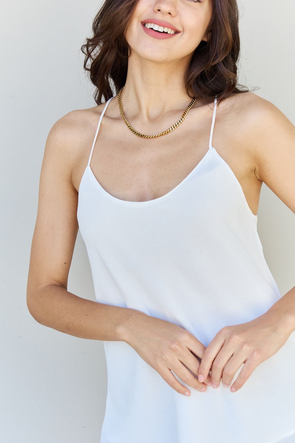 HYFVE Make Me Blush Sleeveless Chiffon Cami Top in soft chiffon fabric, featuring a scoop neckline and spaghetti straps, perfect for summer wear.