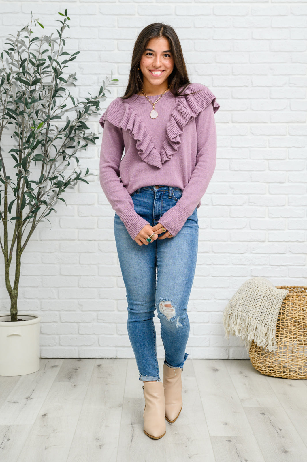 I Choose You Sweater in Purple featuring ruffle v-shaped detail and cuffed wrists, displayed on a model.