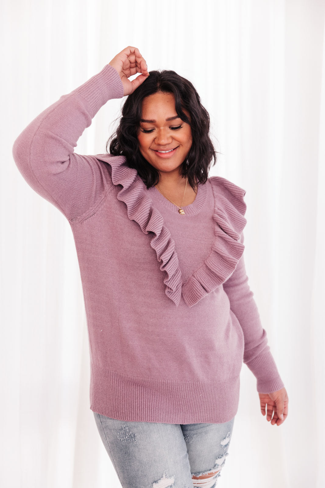 I Choose You Sweater in Purple featuring ruffle v-shaped detail and cuffed wrists, displayed on a model.