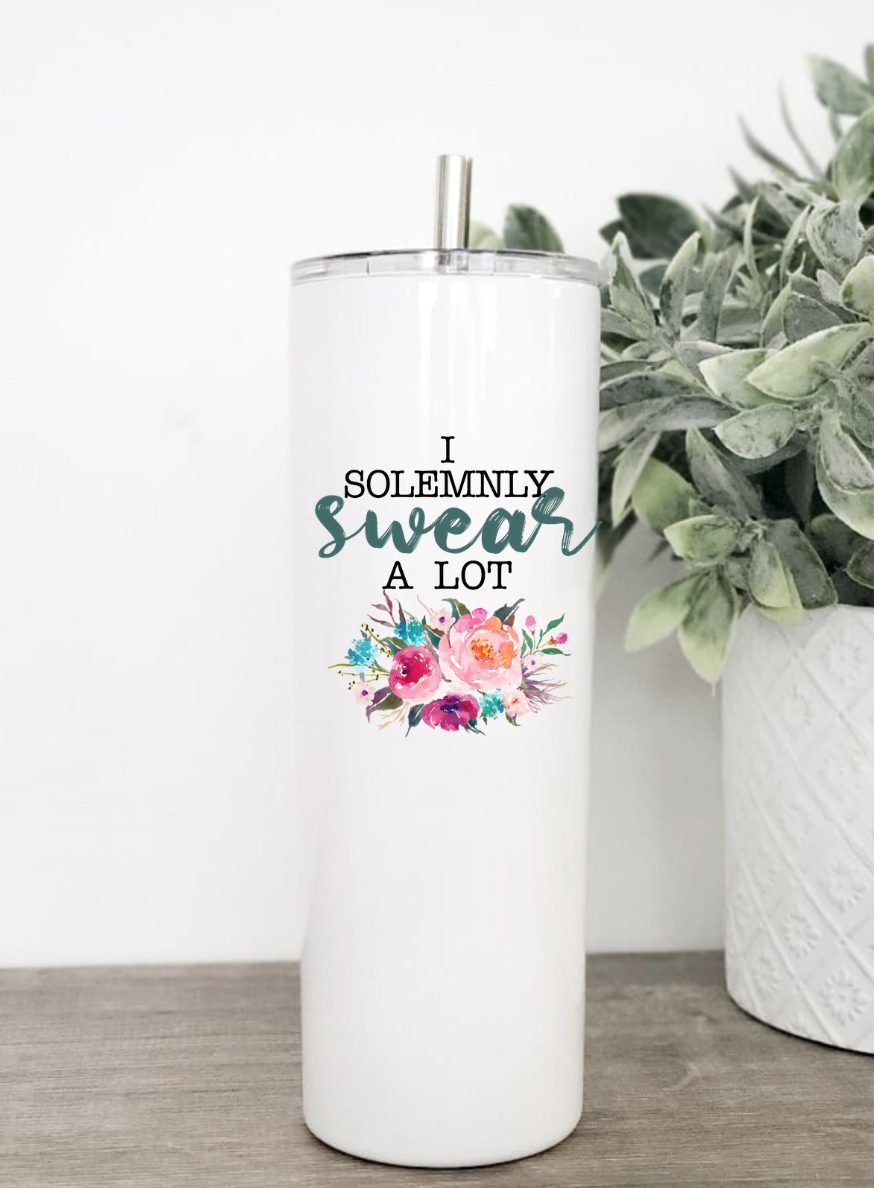 I Solemnly Swear A Lot floral tumbler with clear lid and stainless steel straw, showcasing vibrant floral design.