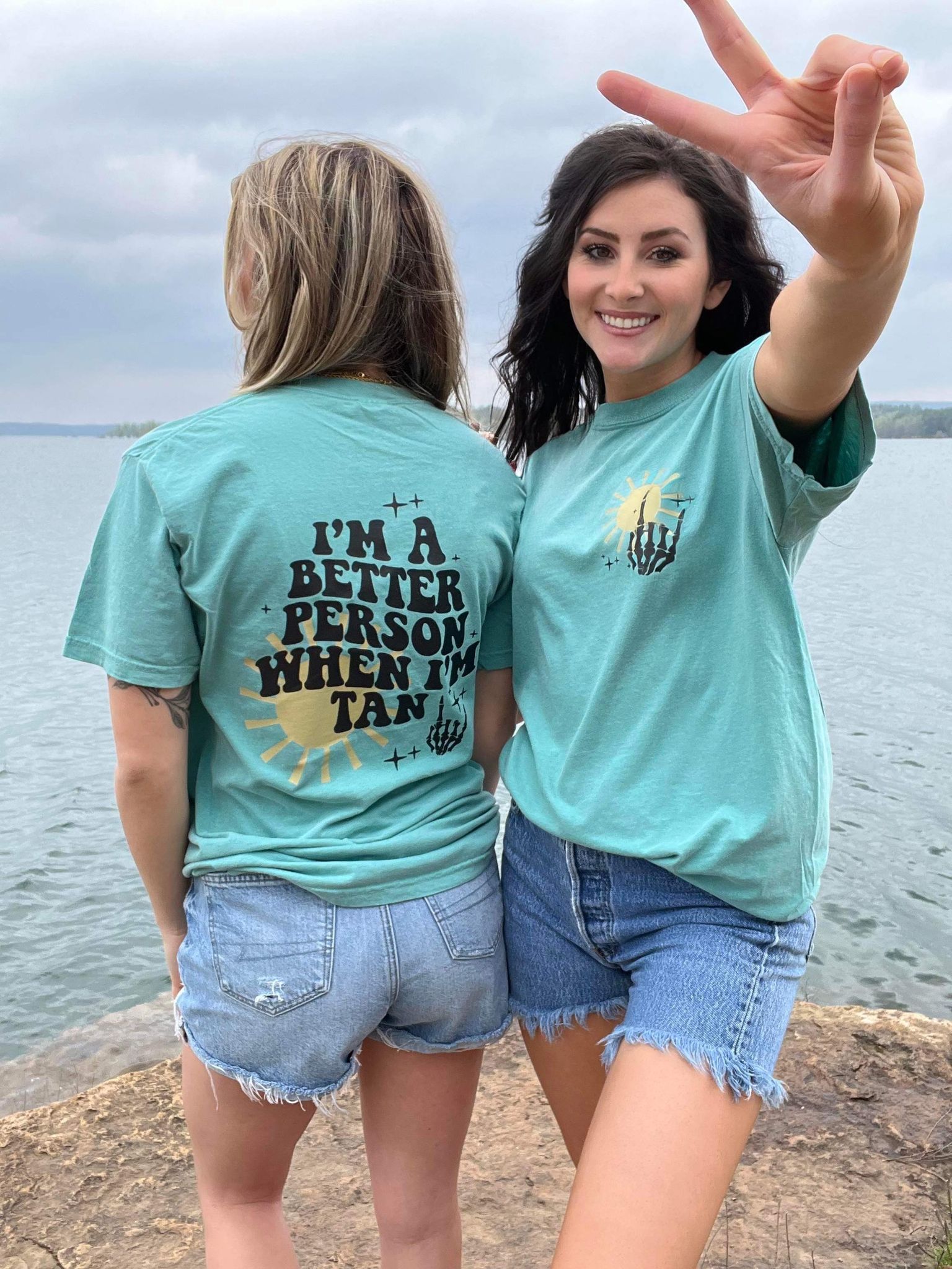 I'm A Better Person When I'm Tan Tee in Ivory and Seafoam colors, showcasing a comfortable unisex fit and vibrant DTF printed design.