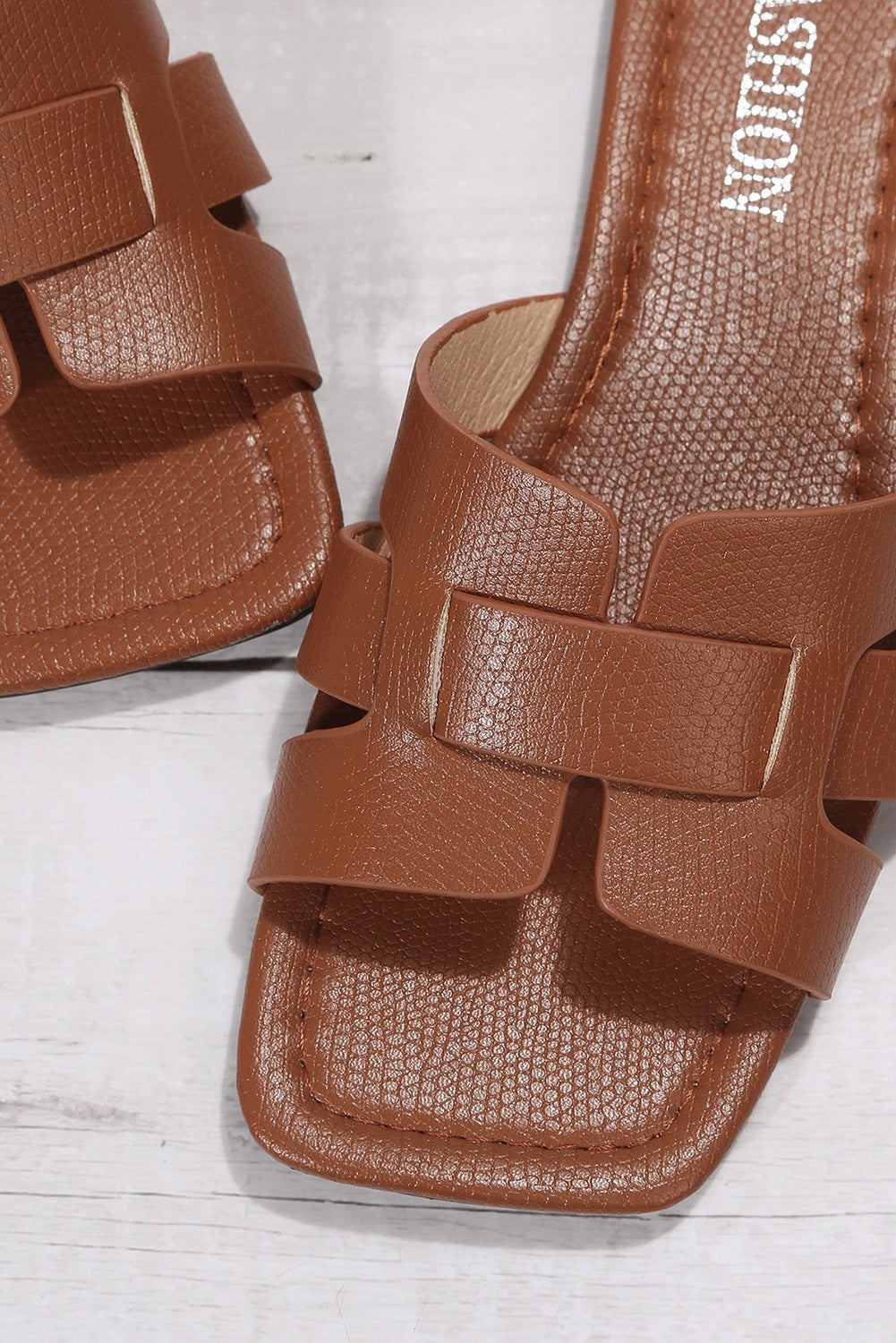 Brown imitation leather sandals with a wide instep strap and square toe design, perfect for comfort and style.