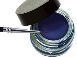 Indelible Gel Eyeliner in various vibrant colors displayed in a sleek container, showcasing its smooth texture and precision applicator.