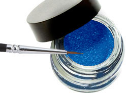 Indelible Gel Eyeliner in various vibrant colors displayed in a sleek container, showcasing its smooth texture and precision applicator.