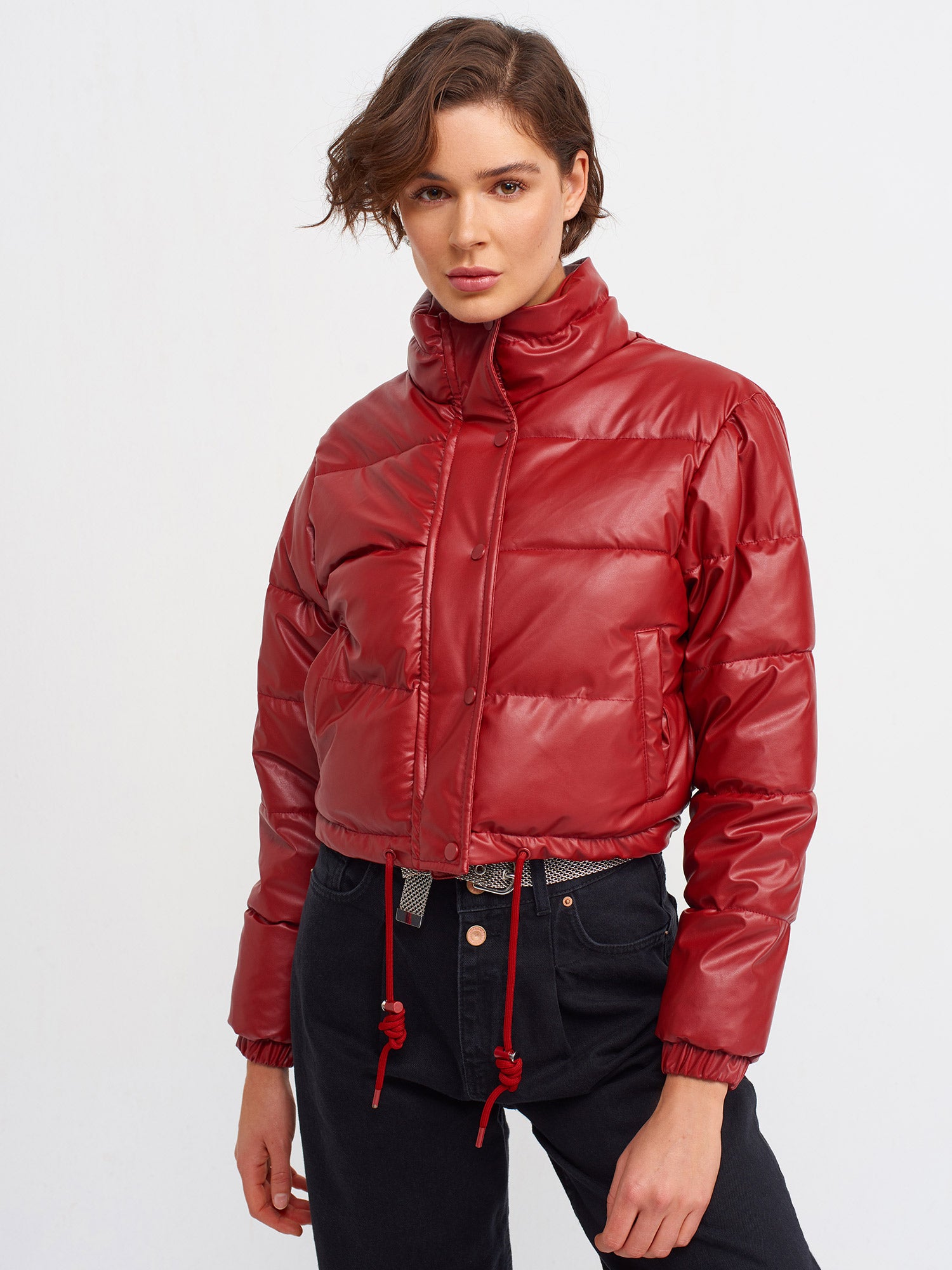 A stylish inflatable coat made from polyester and polyurethane, showcasing its lightweight and water-resistant features.