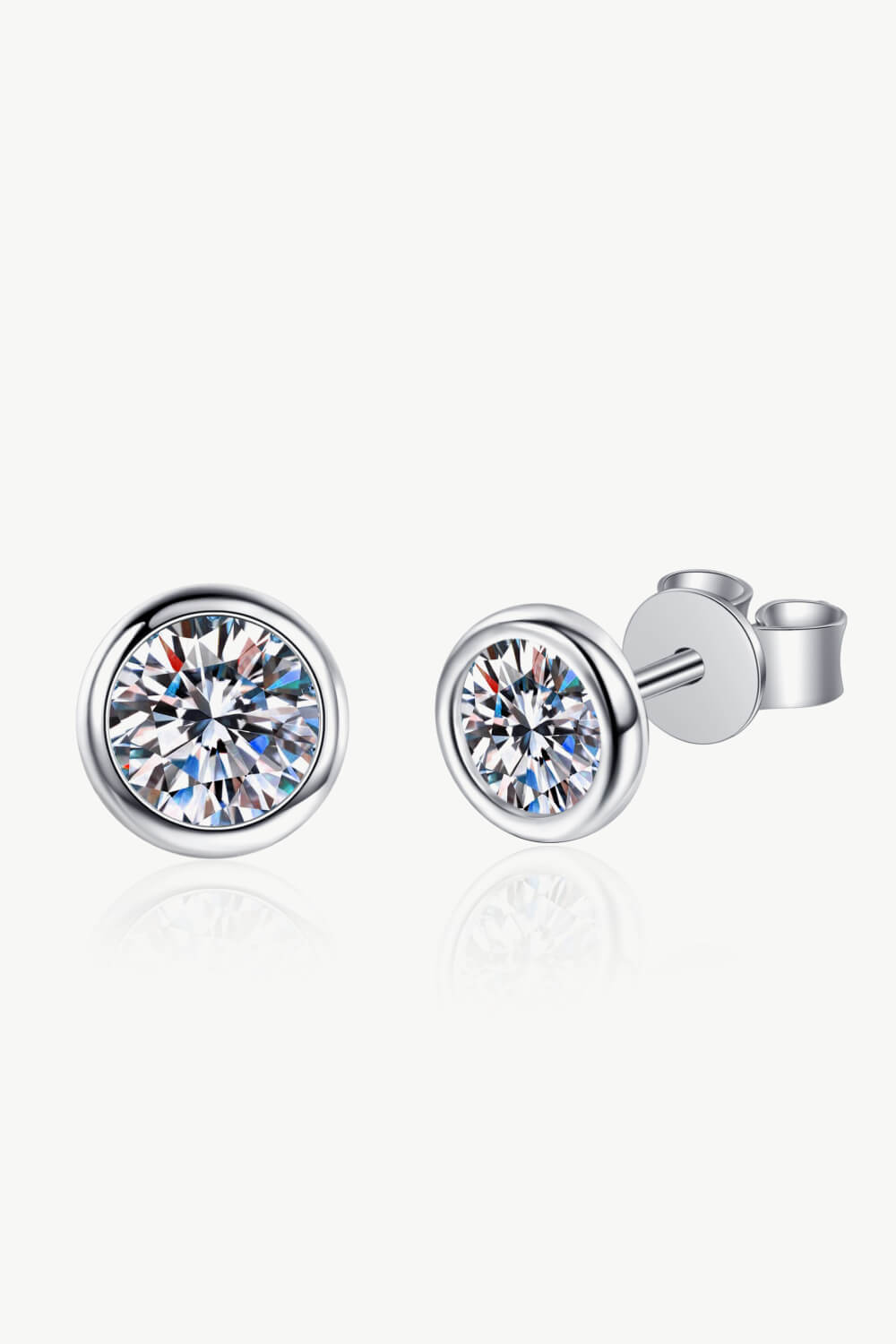 A pair of elegant Inlaid 1 Carat Moissanite Stud Earrings set in 925 sterling silver, showcasing their brilliant sparkle.