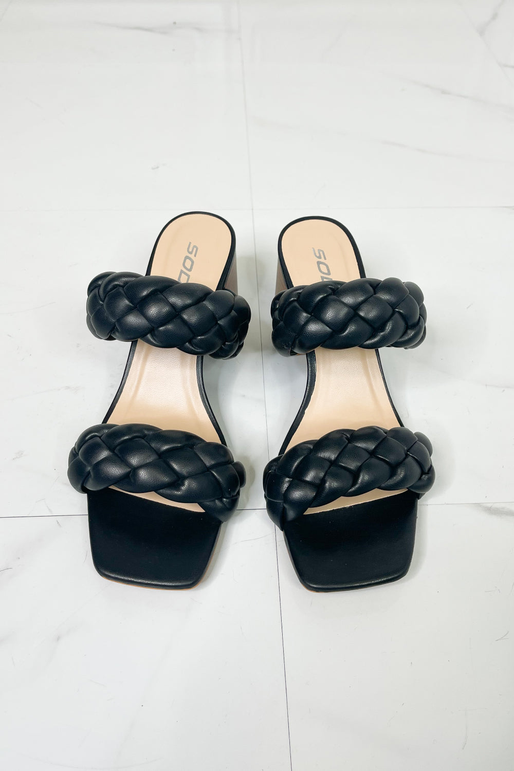 Interwoven Ideas Braided Strap Block Heel Slide Sandal in Black featuring a chic braided double-strap design and a comfortable open toe.