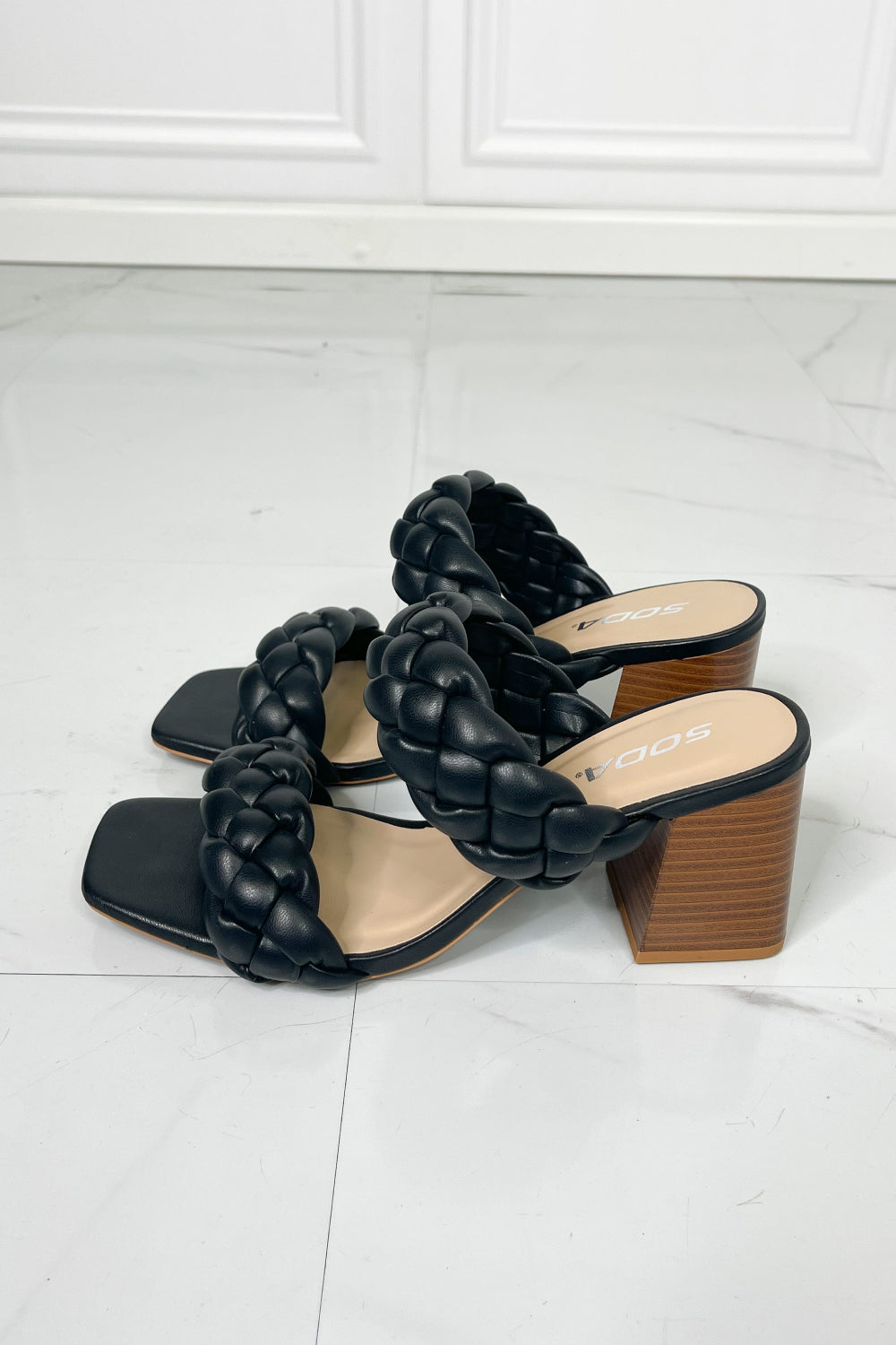 Interwoven Ideas Braided Strap Block Heel Slide Sandal in Black featuring a chic braided double-strap design and a comfortable open toe.