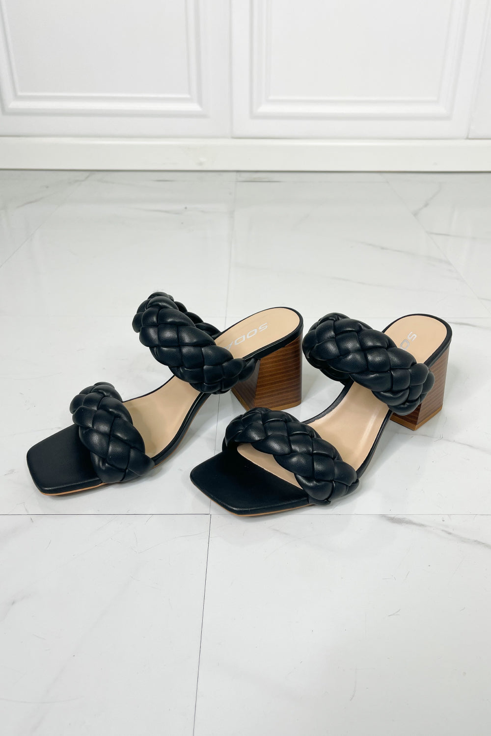 Interwoven Ideas Braided Strap Block Heel Slide Sandal in Black featuring a chic braided double-strap design and a comfortable open toe.