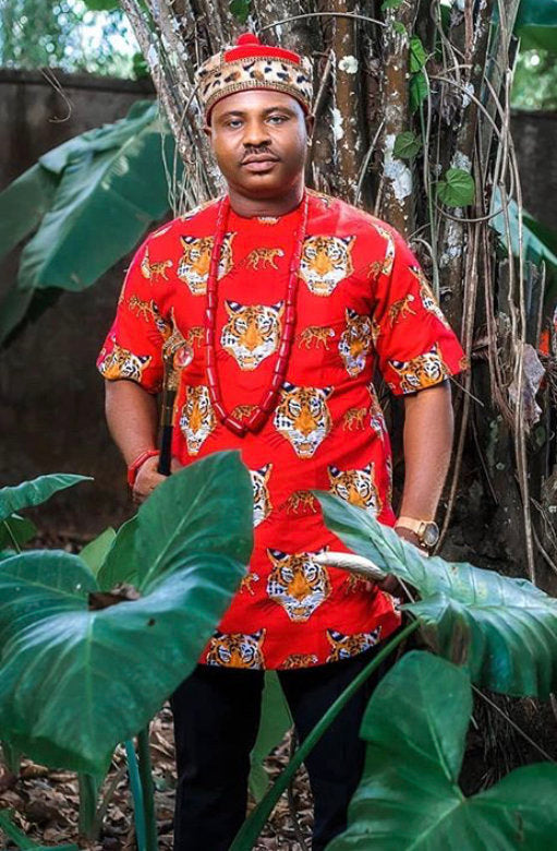 A vibrant Isiagu African shirt made from high-quality fabric, showcasing unique patterns and colors, perfect for cultural events.