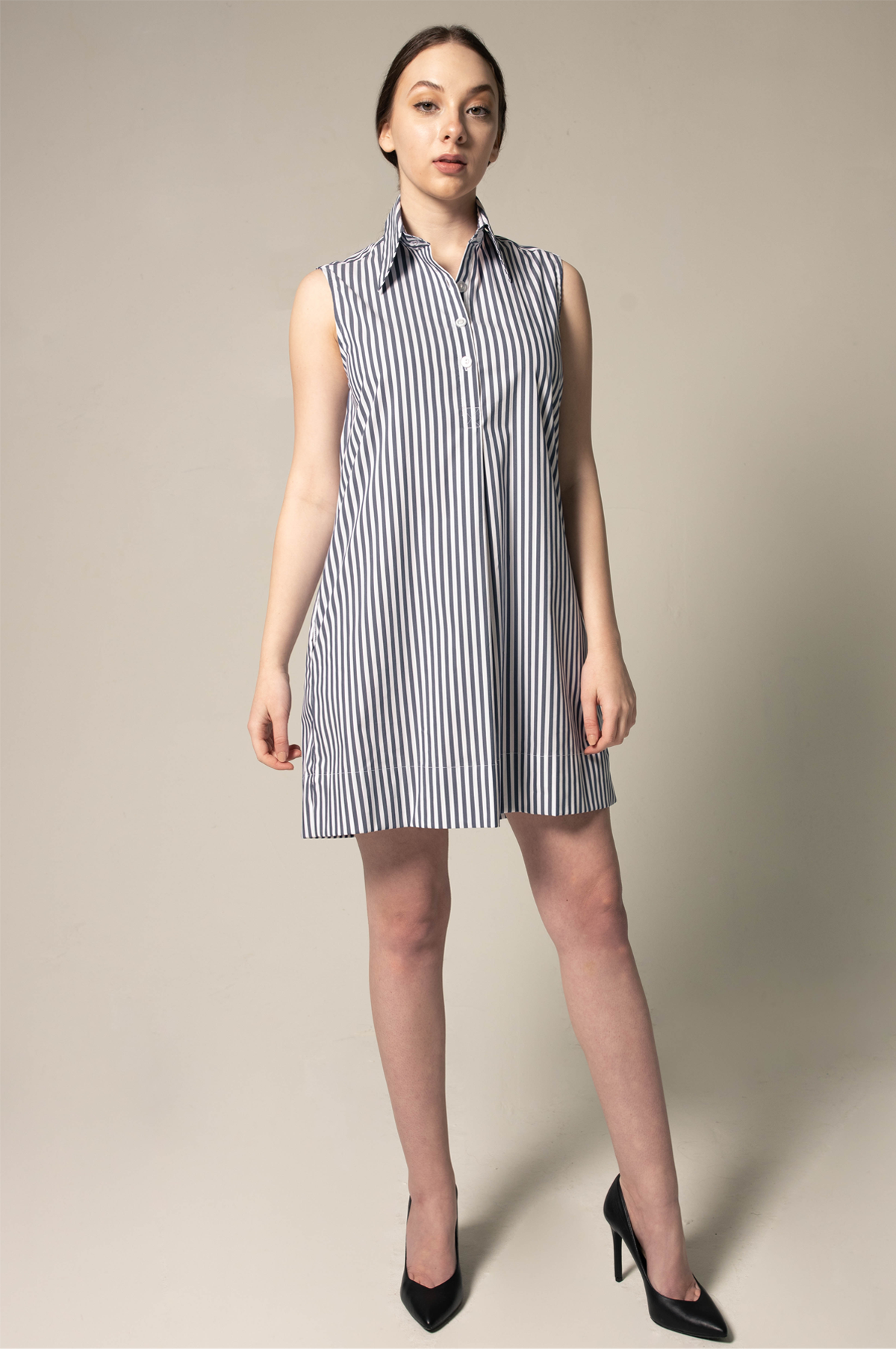 A stylish Italian cotton blue stripe sleeveless dress, perfect for summer wear, featuring a comfortable fit and elegant design.