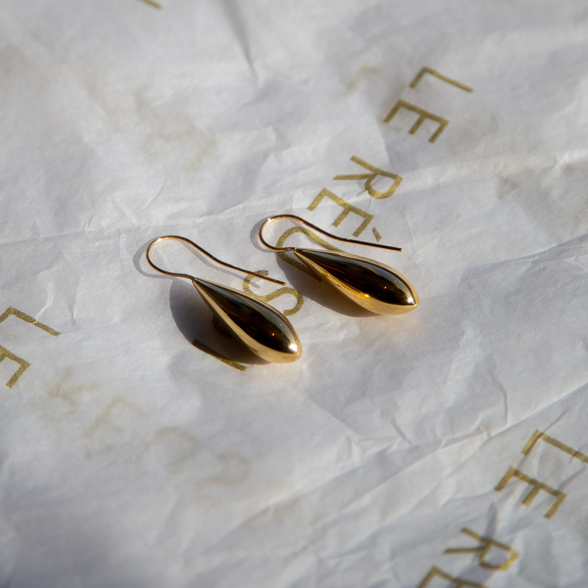 Elegant Italian Gilded Teardrop Statement Earrings in yellow gold dip, showcasing a classic teardrop design.