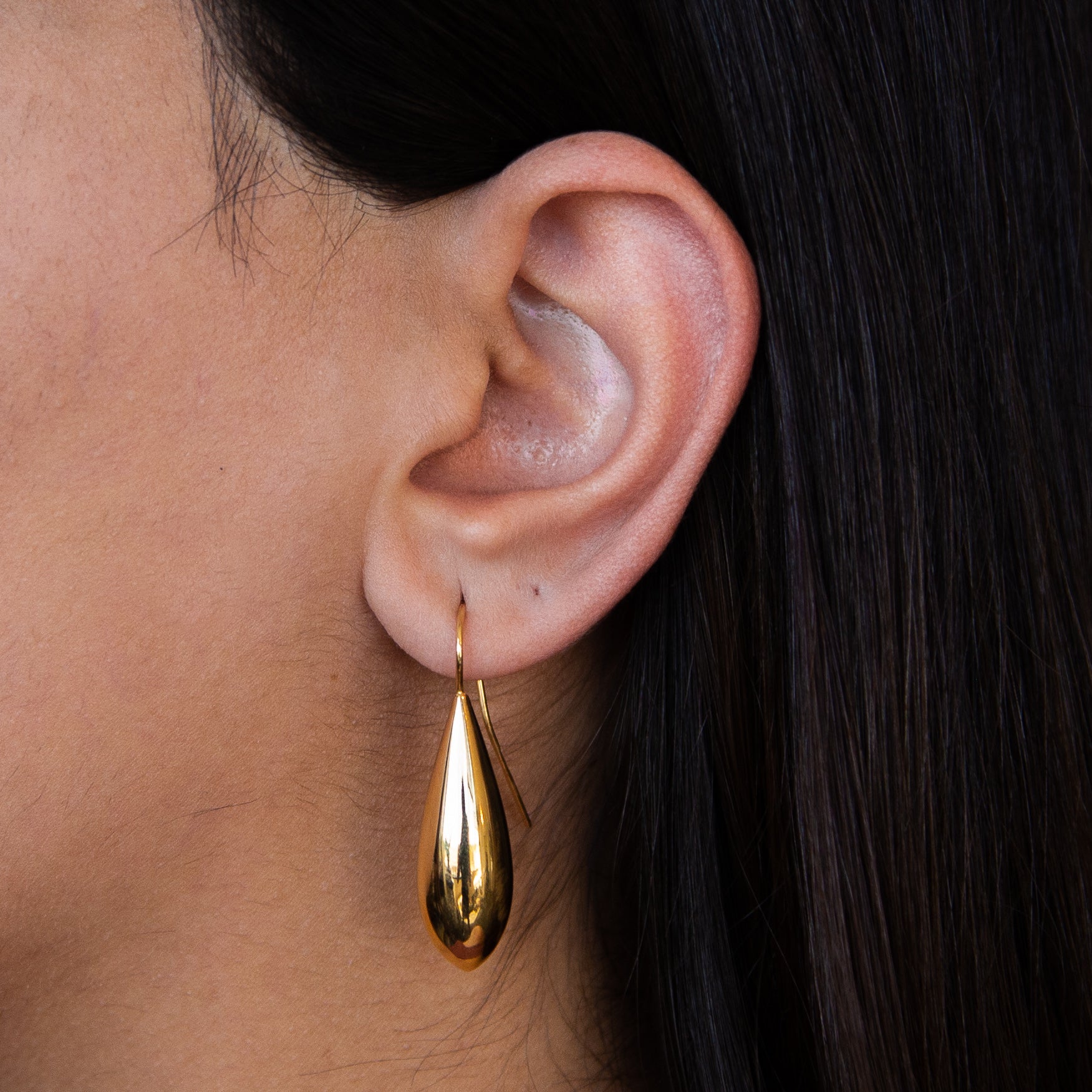 Elegant Italian Gilded Teardrop Statement Earrings in yellow gold dip, showcasing a classic teardrop design.