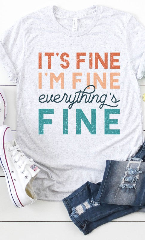 A stylish white graphic tee featuring the text 'It's Fine I'm Fine Everything's Fine' in a playful font, made from soft cotton material.