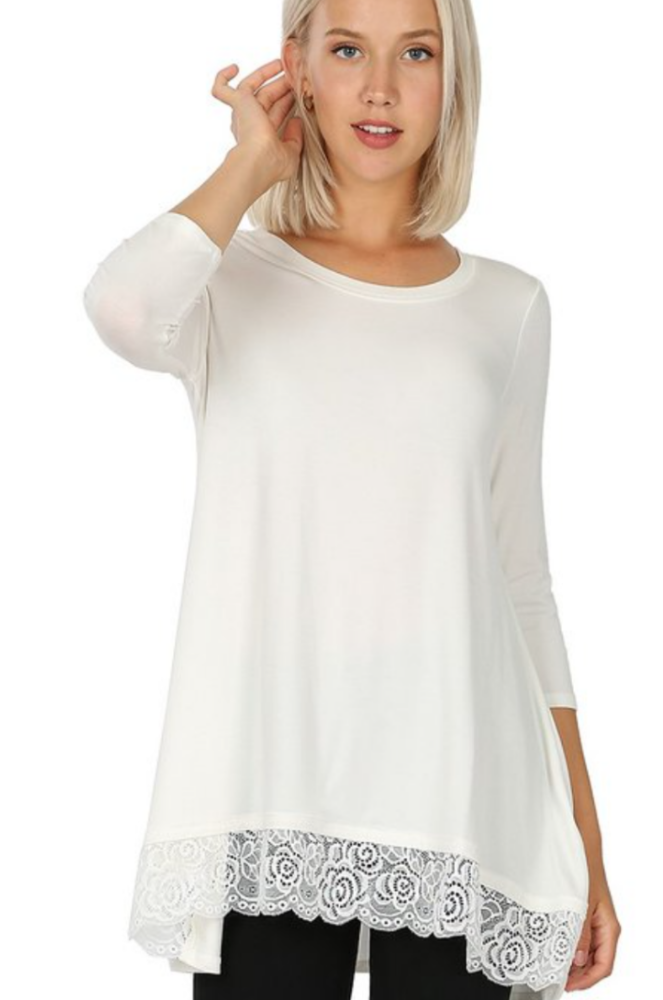 Ivory 3/4 sleeve tunic featuring a delicate lace hem, perfect for layering and stylish outfits.