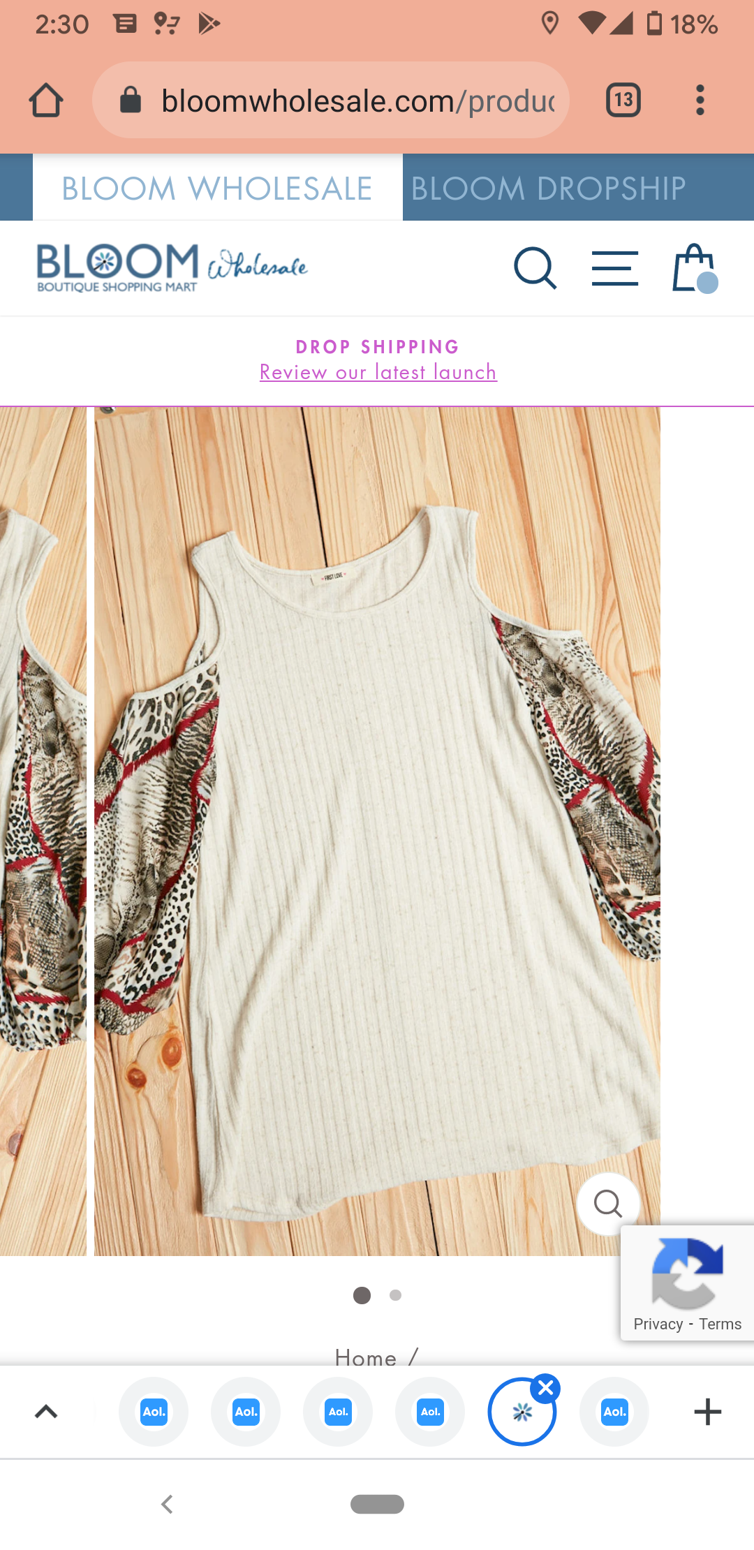 Ivory cold shoulder tunic with animal print and chiffon sleeves, perfect for fall fashion.