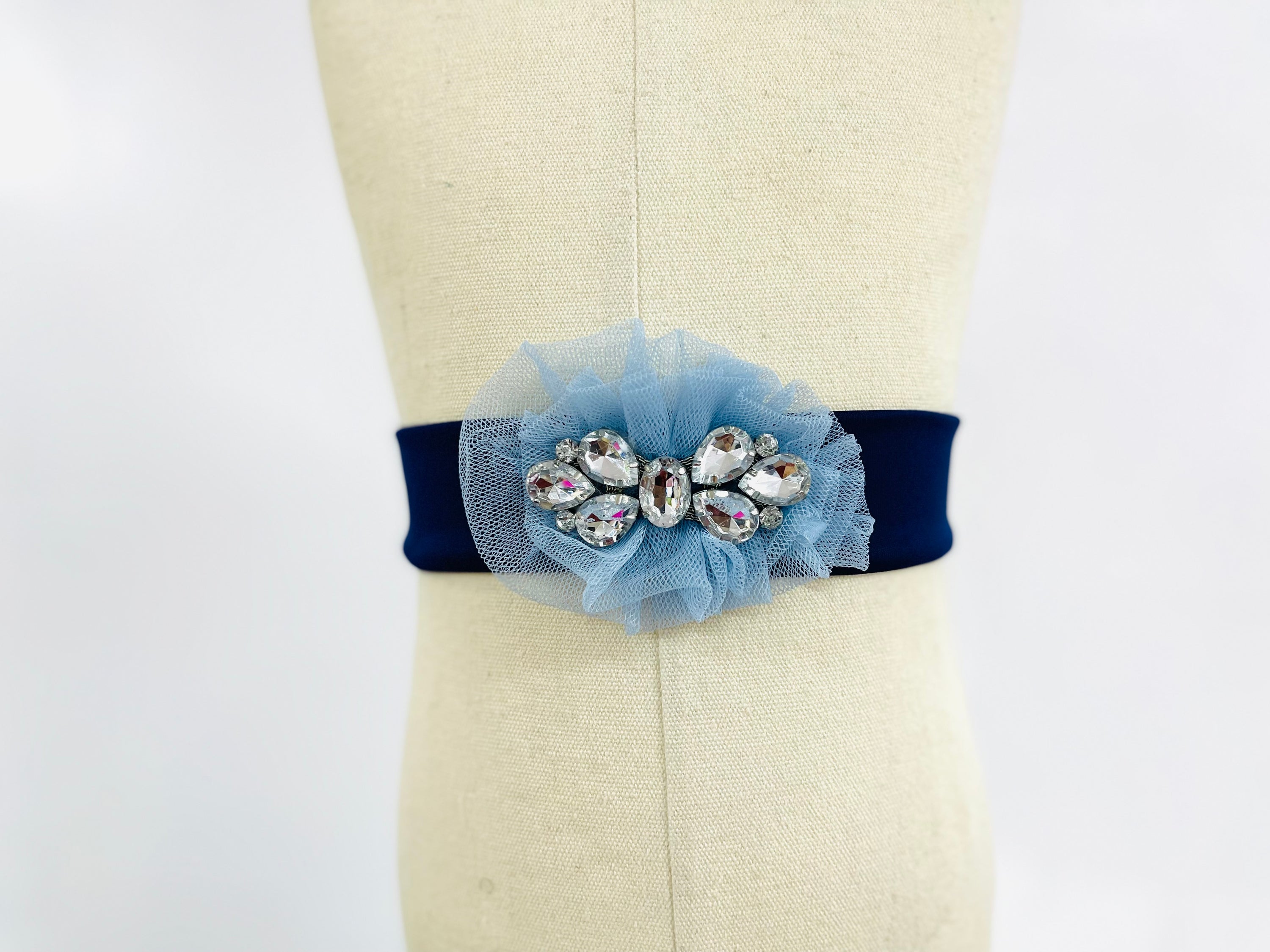 Ixora Belt featuring a bejewel tulle ruffle bow, elegantly designed for a sophisticated look.